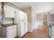 Kitchen with white appliances and wood countertops at 4618 Shallowford Rd, Roswell, GA 30075