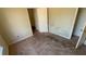 Bedroom with stained carpeting and closet at 4990 Windsor Downs Dr, Decatur, GA 30035