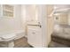 Updated bathroom with white vanity and tile flooring at 4079 Parks Ln, Douglasville, GA 30135