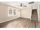 Living room featuring hardwood floors and a staircase at 4079 Parks Ln, Douglasville, GA 30135