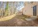 Backyard featuring a partial view of the home with a deck at 4547 Doral Sw Dr, Atlanta, GA 30331