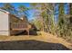 Backyard with a wood deck overlooking the lot at 4547 Doral Sw Dr, Atlanta, GA 30331