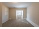 Carpeted bedroom with a window seat and natural light at 4547 Doral Sw Dr, Atlanta, GA 30331