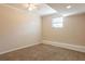 Bedroom featuring neutral paint and carpet and a window at 4547 Doral Sw Dr, Atlanta, GA 30331