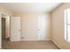 Neutral bedroom with window and closet at 4547 Doral Sw Dr, Atlanta, GA 30331