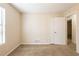 Neutral bedroom with a window to the left at 4547 Doral Sw Dr, Atlanta, GA 30331