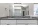 Double vanity with granite countertop and white cabinets at 508 Cascade Walk, Mcdonough, GA 30253