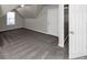 Bright bedroom with grey carpet and sloped ceilings at 508 Cascade Walk, Mcdonough, GA 30253