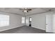 Primary bedroom with ceiling fan and ensuite bathroom at 508 Cascade Walk, Mcdonough, GA 30253