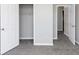 Bedroom with grey carpet and double door closet at 508 Cascade Walk, Mcdonough, GA 30253