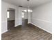 Spacious dining room with tile floors and a view of the entryway at 508 Cascade Walk, Mcdonough, GA 30253