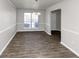 Spacious dining room with tile floors and a view of the living room at 508 Cascade Walk, Mcdonough, GA 30253