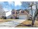 Two-story house with tan siding, red shutters, and a large tree in the front yard at 508 Cascade Walk, Mcdonough, GA 30253