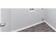 Laundry room with tile floor and built in shelving at 508 Cascade Walk, Mcdonough, GA 30253