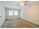 Spacious bedroom with neutral walls and carpet at 1728 W Austin Rd, Decatur, GA 30032