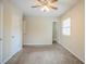 Spacious bedroom with ceiling fan and closet at 1728 W Austin Rd, Decatur, GA 30032