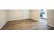Simple dining area with wood-look floors and access to kitchen at 1728 W Austin Rd, Decatur, GA 30032