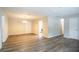Bright dining room featuring wood-look flooring and kitchen access at 1728 W Austin Rd, Decatur, GA 30032