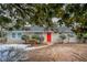 Charming single story home with red front door and landscaping at 1728 W Austin Rd, Decatur, GA 30032