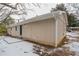 Rear view of house showing patio, yard, and landscaping at 1728 W Austin Rd, Decatur, GA 30032