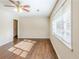 Bright bedroom with hardwood floors and a large window at 3197 Cloverhurst Dr, Atlanta, GA 30344