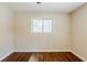 Bedroom featuring hardwood floors and a window at 3197 Cloverhurst Dr, Atlanta, GA 30344