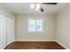 Bedroom featuring a window for natural light and a ceiling fan at 3197 Cloverhurst Dr, Atlanta, GA 30344