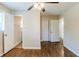 Bedroom featuring hardwood floors and access to bathroom and closet at 3197 Cloverhurst Dr, Atlanta, GA 30344