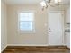 Cozy dining area with a window and modern light fixture at 3197 Cloverhurst Dr, Atlanta, GA 30344