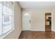 Inviting living room featuring gleaming hardwood floors and a sunny window at 3197 Cloverhurst Dr, Atlanta, GA 30344