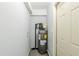 Small utility room with gray walls and water heater at 3197 Cloverhurst Dr, Atlanta, GA 30344