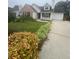Inviting home with lush green lawn and well-kept front yard at 3745 Hudson Ct, Rex, GA 30273