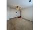 Living room with neutral walls, carpet flooring, and ceiling fan at 3745 Hudson Ct, Rex, GA 30273