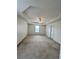 This is a spacious main bedroom with neutral walls, carpet flooring, and a ceiling fan at 3745 Hudson Ct, Rex, GA 30273