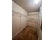 Walk-in closet with metal shelving and carpet flooring at 3745 Hudson Ct, Rex, GA 30273