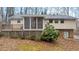 Home features a deck and screened porch at 3870 N Shelby N Ln, Douglasville, GA 30135