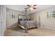 Spacious bedroom with carpeted floors and ceiling fan at 3870 N Shelby N Ln, Douglasville, GA 30135