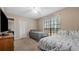 Spacious bedroom with king bed and window at 3870 N Shelby N Ln, Douglasville, GA 30135