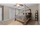 Bedroom with carpeted floors, ceiling fan and large closet at 3870 N Shelby N Ln, Douglasville, GA 30135