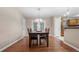 Charming dining room with hardwood floors and a view to the backyard at 3870 N Shelby N Ln, Douglasville, GA 30135