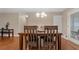 Bright dining room with hardwood floors and chandelier at 3870 N Shelby N Ln, Douglasville, GA 30135
