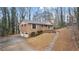 Brick ranch home with attached garage and a long driveway at 3870 N Shelby N Ln, Douglasville, GA 30135
