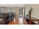 Bright living room with hardwood floors and a view into the backyard at 3870 N Shelby N Ln, Douglasville, GA 30135