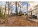 Large backyard with mature trees and a patio at 2249 Clanton Ter, Decatur, GA 30034
