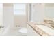 Clean bathroom with granite countertop and tiled floors at 2249 Clanton Ter, Decatur, GA 30034