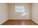 Well-lit bedroom with hardwood floors and window coverings at 2249 Clanton Ter, Decatur, GA 30034