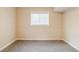 Spacious bedroom with neutral carpet and a window with blinds at 2249 Clanton Ter, Decatur, GA 30034