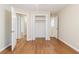 Bedroom with hardwood floors and access to closets and other rooms at 2249 Clanton Ter, Decatur, GA 30034