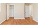 Bedroom with hardwood floors, neutral walls, and a closet at 2249 Clanton Ter, Decatur, GA 30034