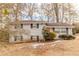 Brick ranch house with mature trees and a well-maintained lawn at 2249 Clanton Ter, Decatur, GA 30034